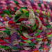 This close up of the knot gives a closer look to the rustic appeal of raw edges and errant threads. This close up of the knot gives a closer look to the rustic appeal of raw edges and errant threads.